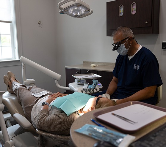 Dentist treating dental patient