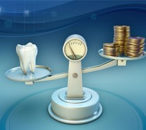 Tooth and coins on a balance scale