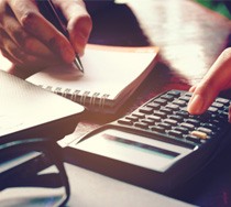 Woman using a calculator