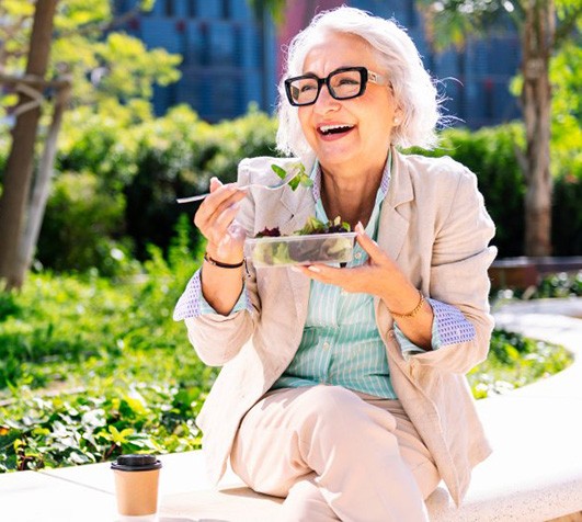 Lady eats salad