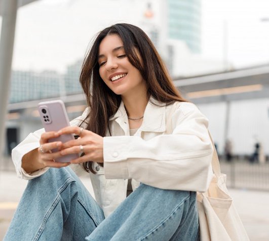 Lady reads something on smartphone?