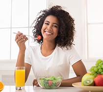 woman eating salad 