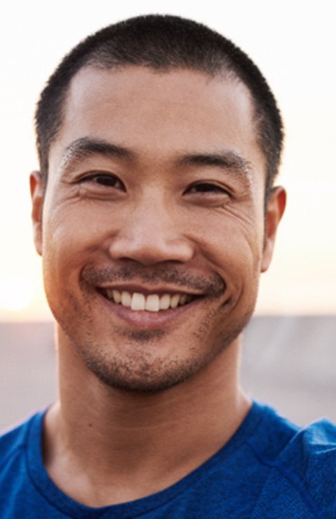 closeup of man smiling outside
