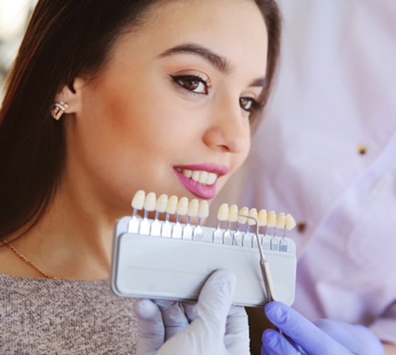 woman getting veneers in New Bedford 