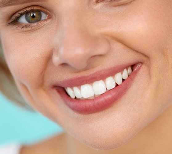 closeup of young woman smiling  