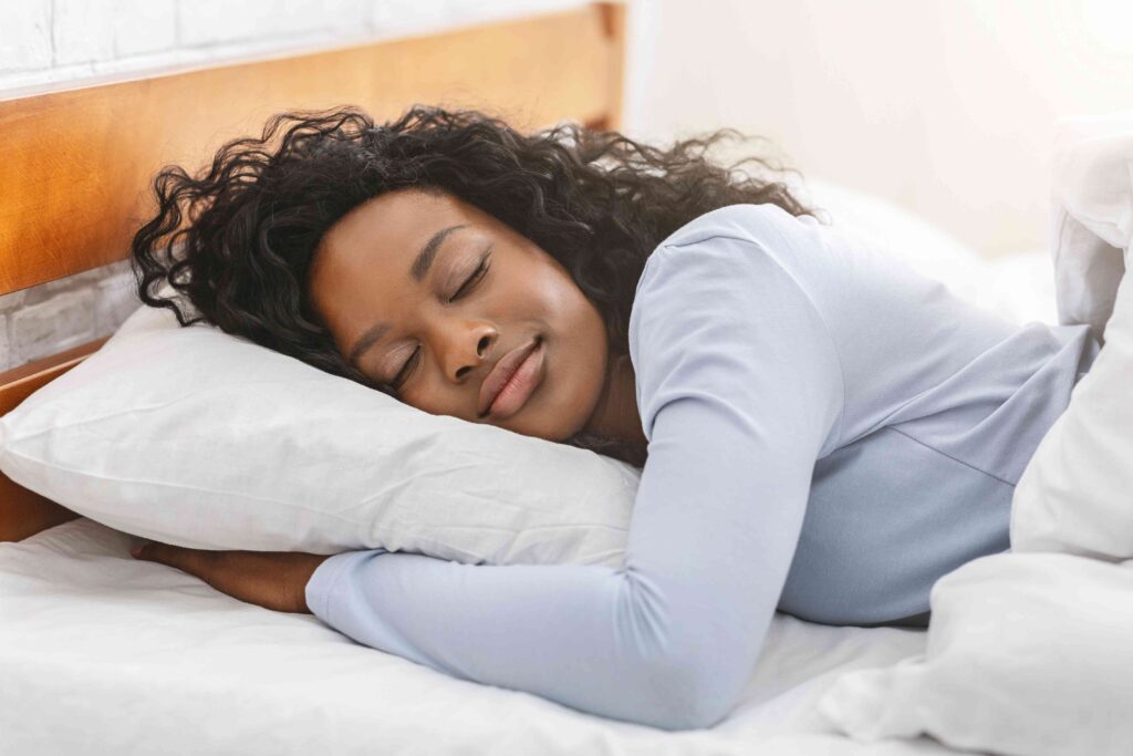 Woman sleeping in bed
