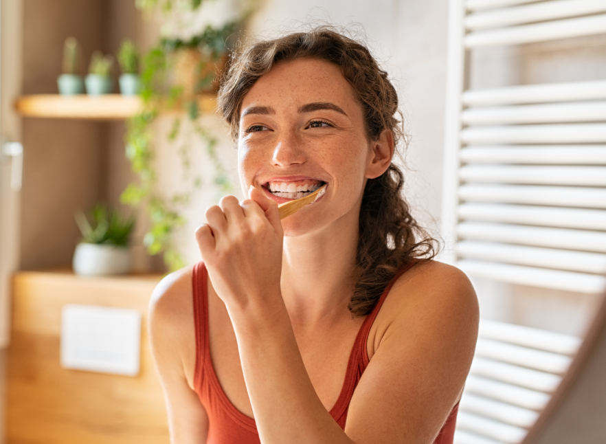 Woman brushing teeth